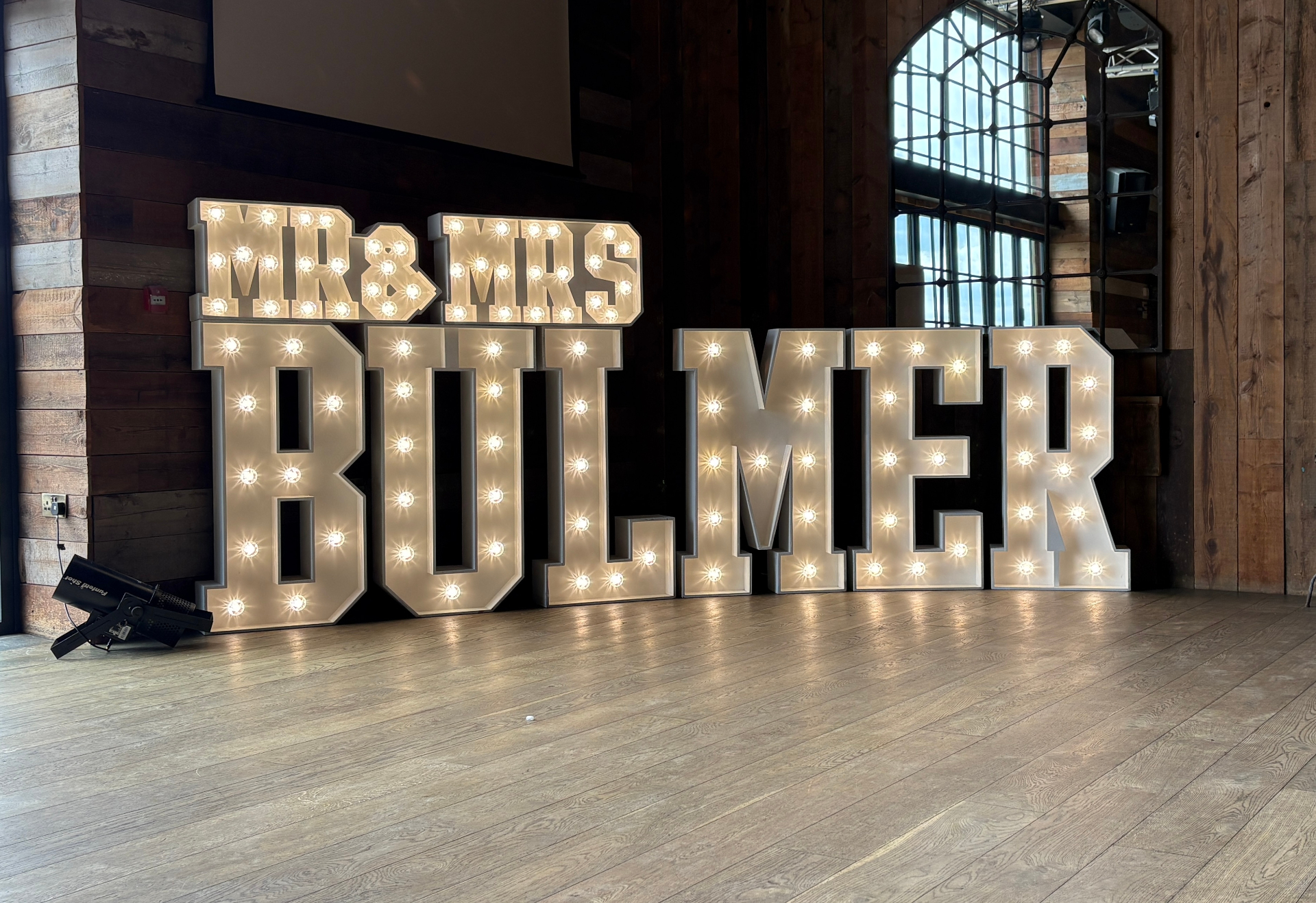 Giant illuminated marquee LOVE letters lit up at a Leeds wedding venue