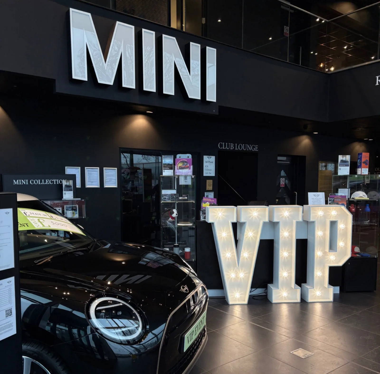 White light up VIP letters at a car showroom launch